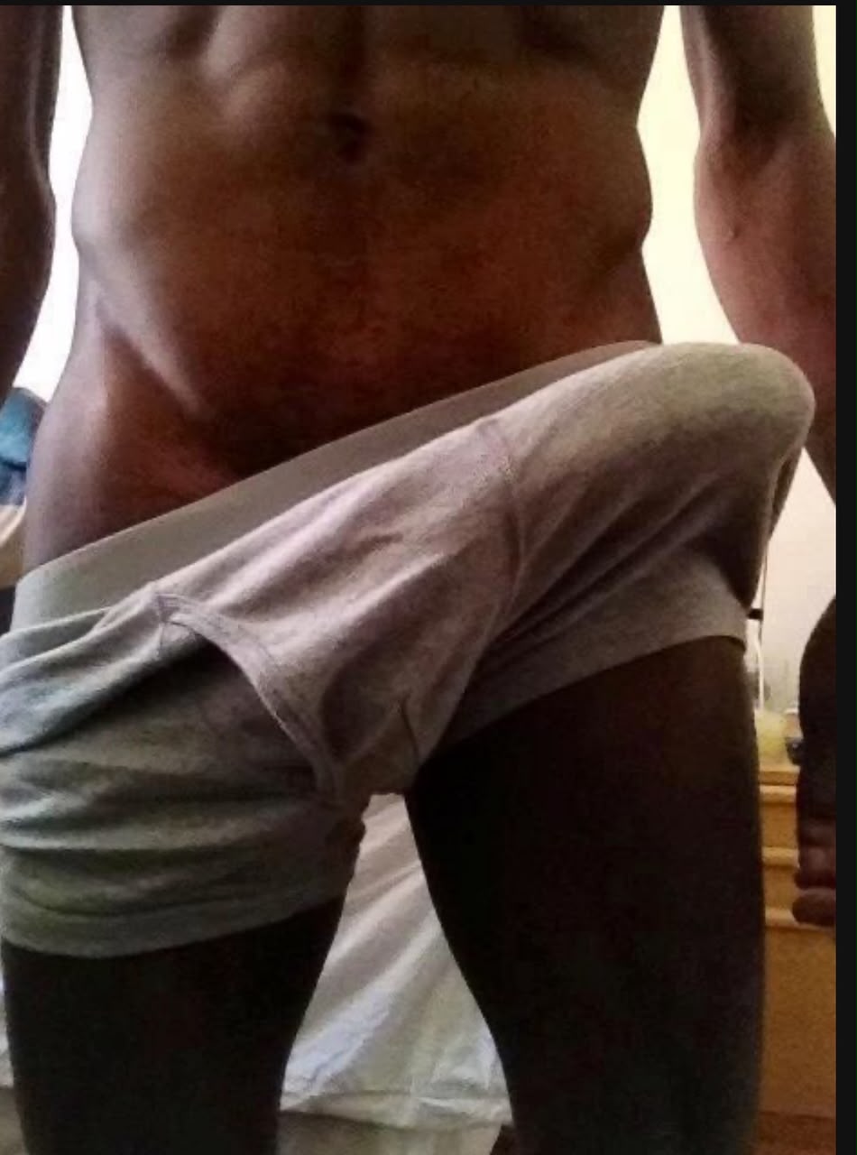 A man showing his physique